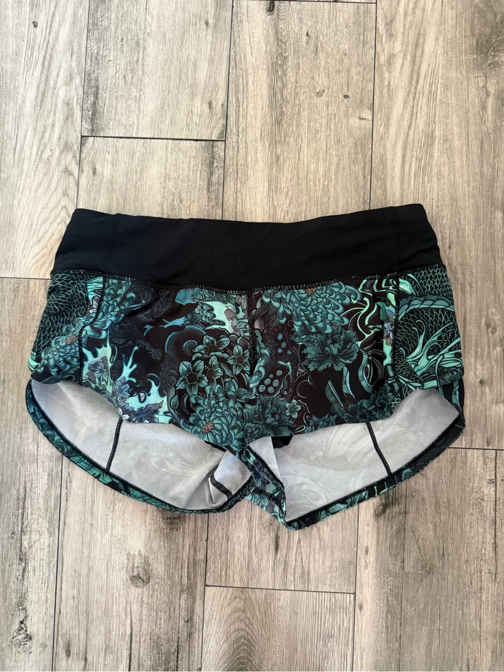 lululemon athletica Teal Floral Print Athletic Shorts with Black Waistband